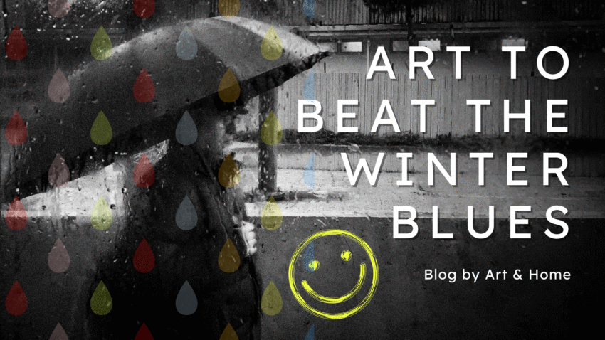 artist in winter shows paining and smiley face